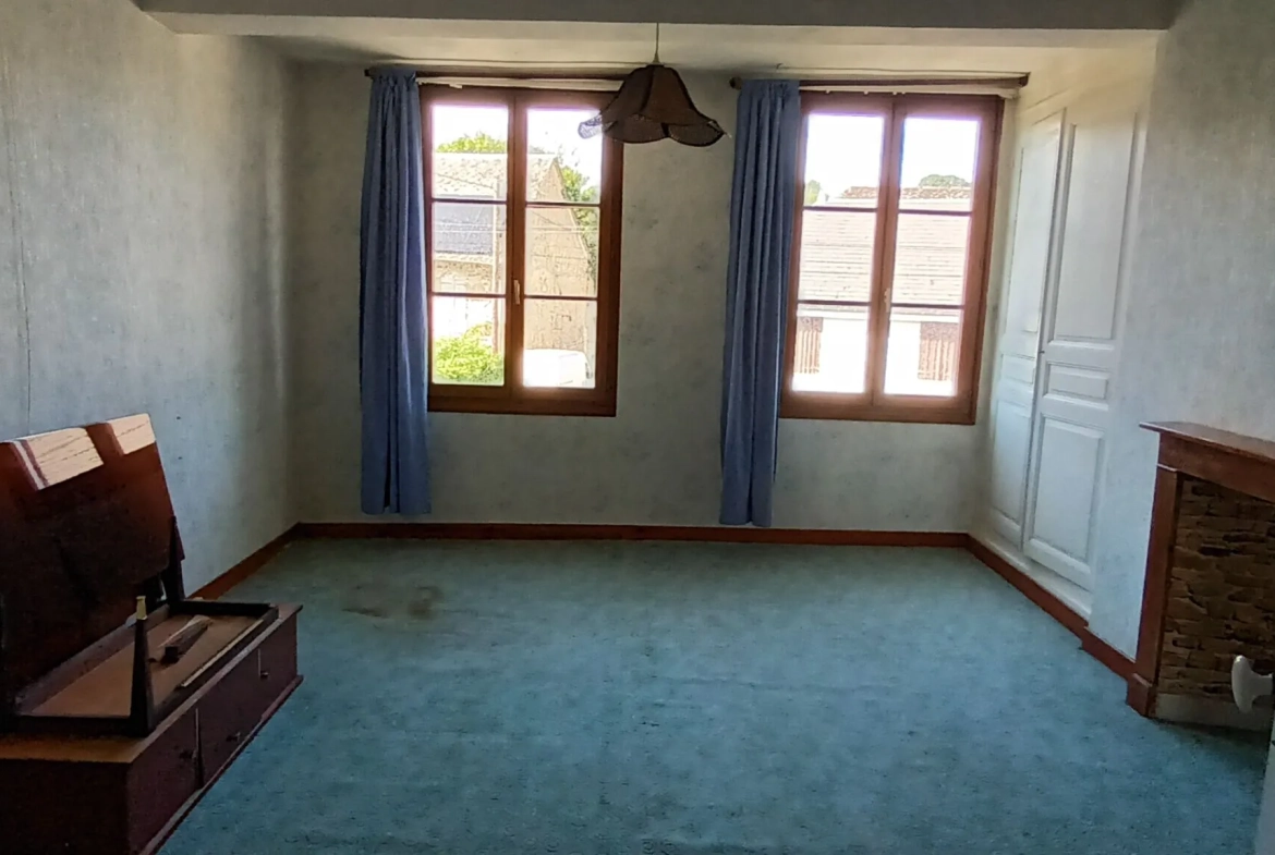 Maison à vendre à Novion-Porcien avec jardin et potentiel d'aménagement 