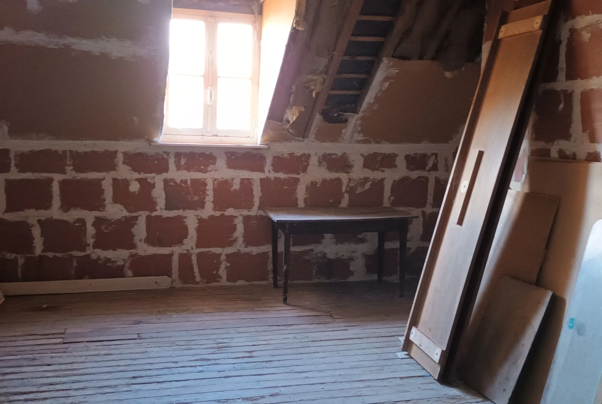Maison à vendre à Novion-Porcien avec jardin et potentiel d'aménagement 