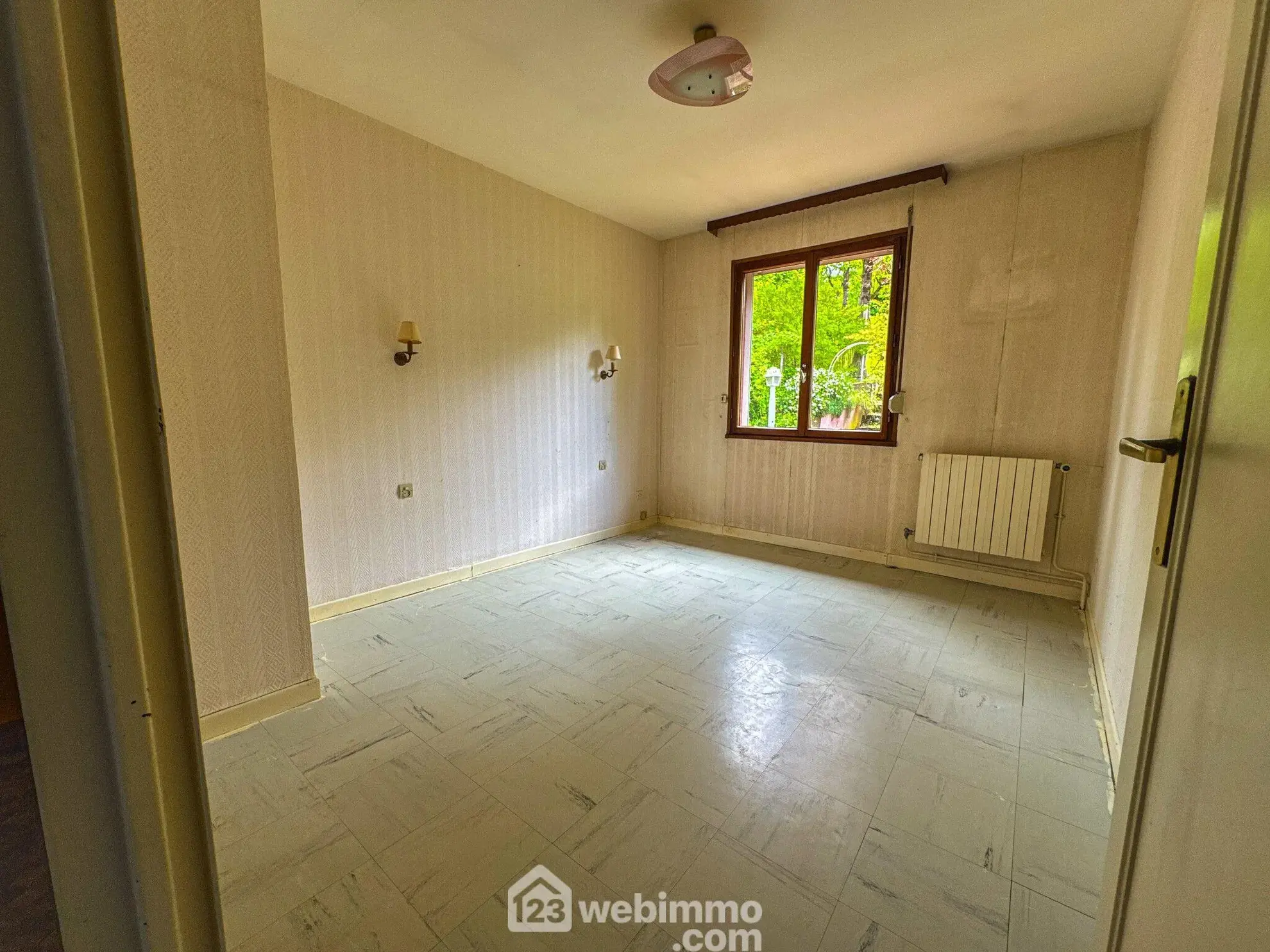 Belle maison de 92m² à Haudainville avec garage et jardin, proche commodités 