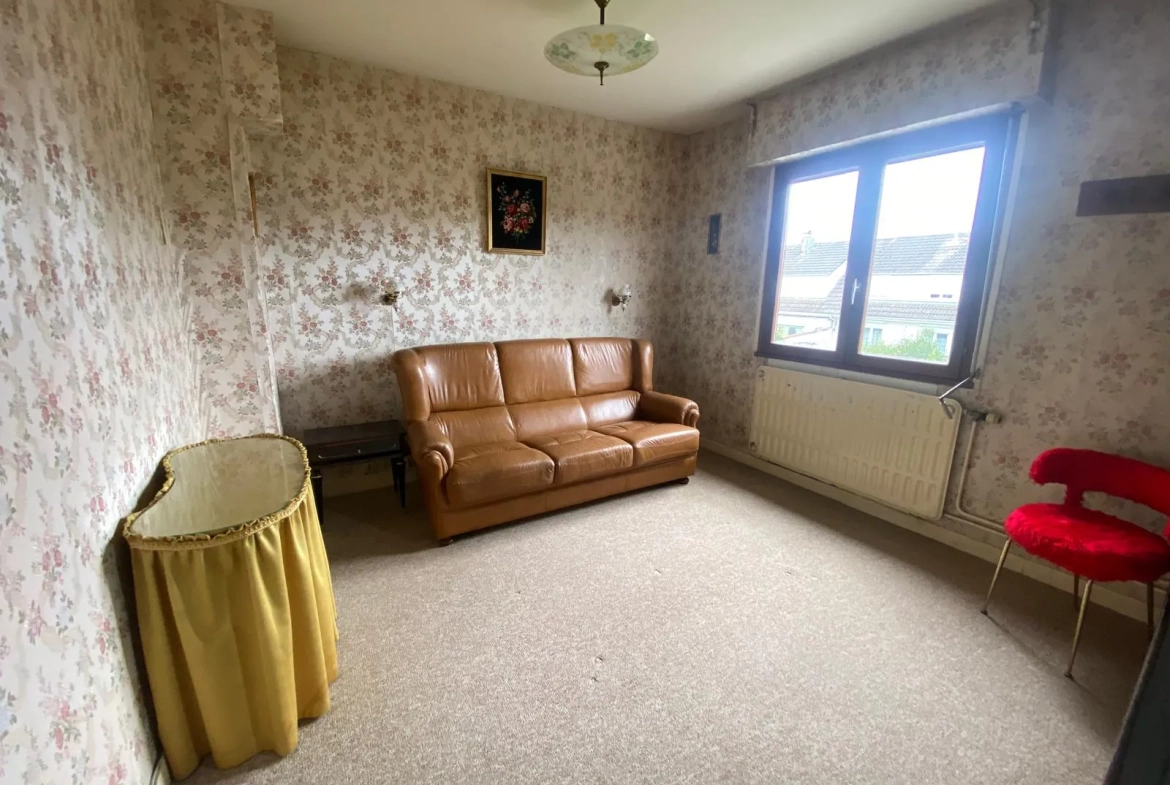 Maison à vendre à Moreuil avec jardin, 3 chambres, garage et quartier calme 