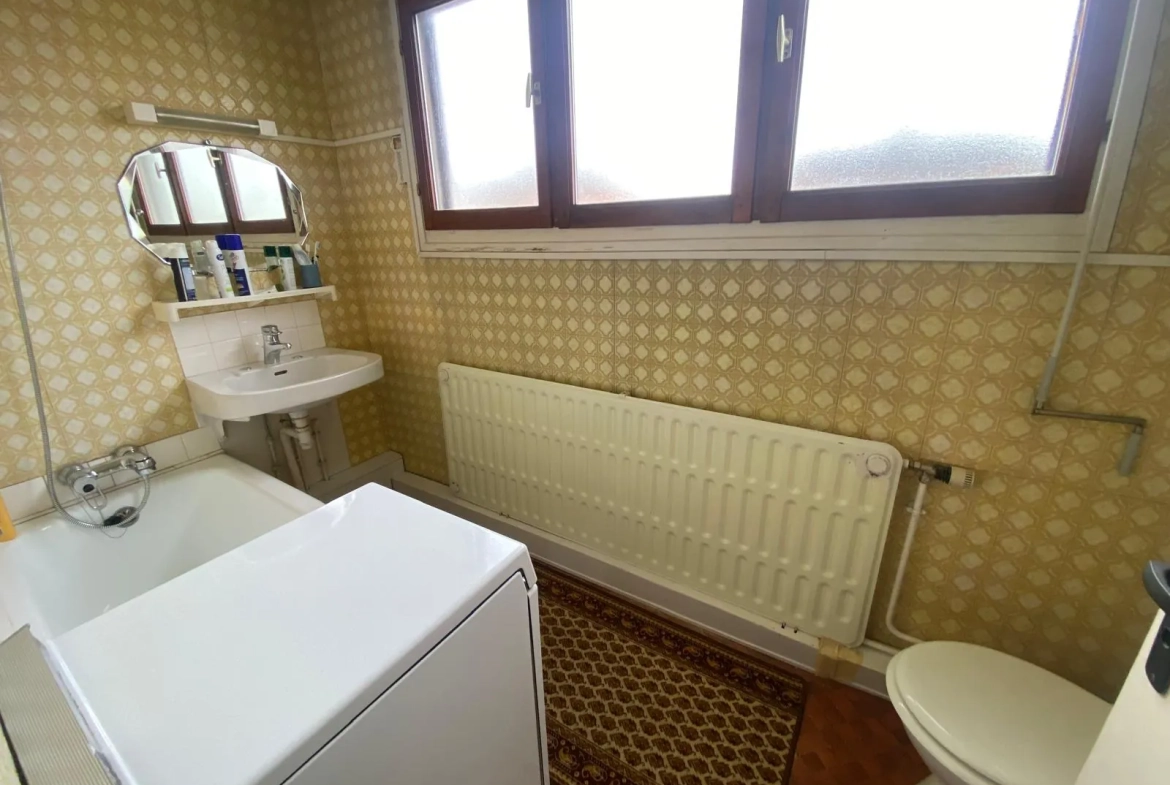 Maison à vendre à Moreuil avec jardin, 3 chambres, garage et quartier calme 