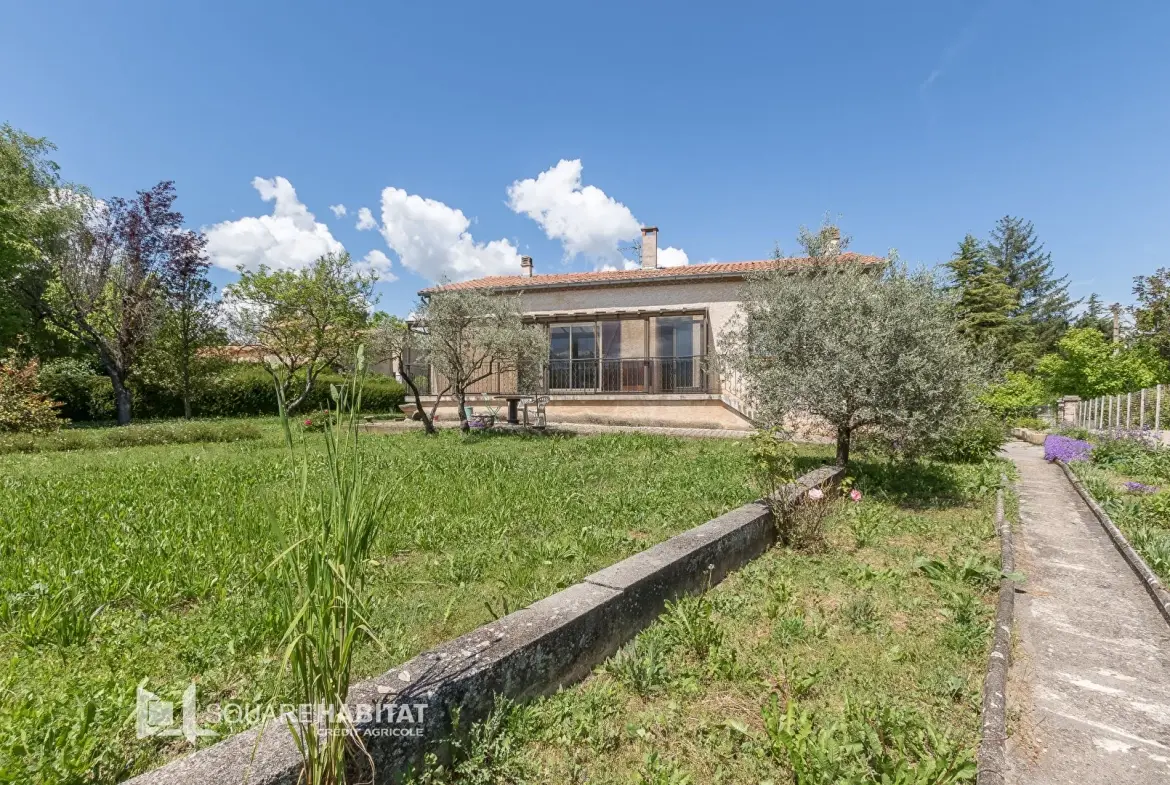 Maison 110 m² avec jardin à Laragne Monteglin - 3 chambres, sous-sol, véranda 