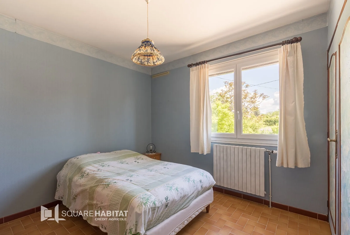 Maison 110 m² avec jardin à Laragne Monteglin - 3 chambres, sous-sol, véranda 