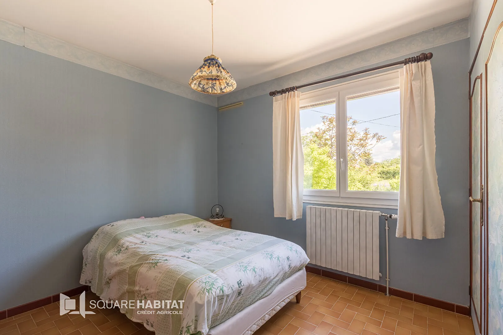 Maison 110 m² avec jardin à Laragne Monteglin - 3 chambres, sous-sol, véranda 