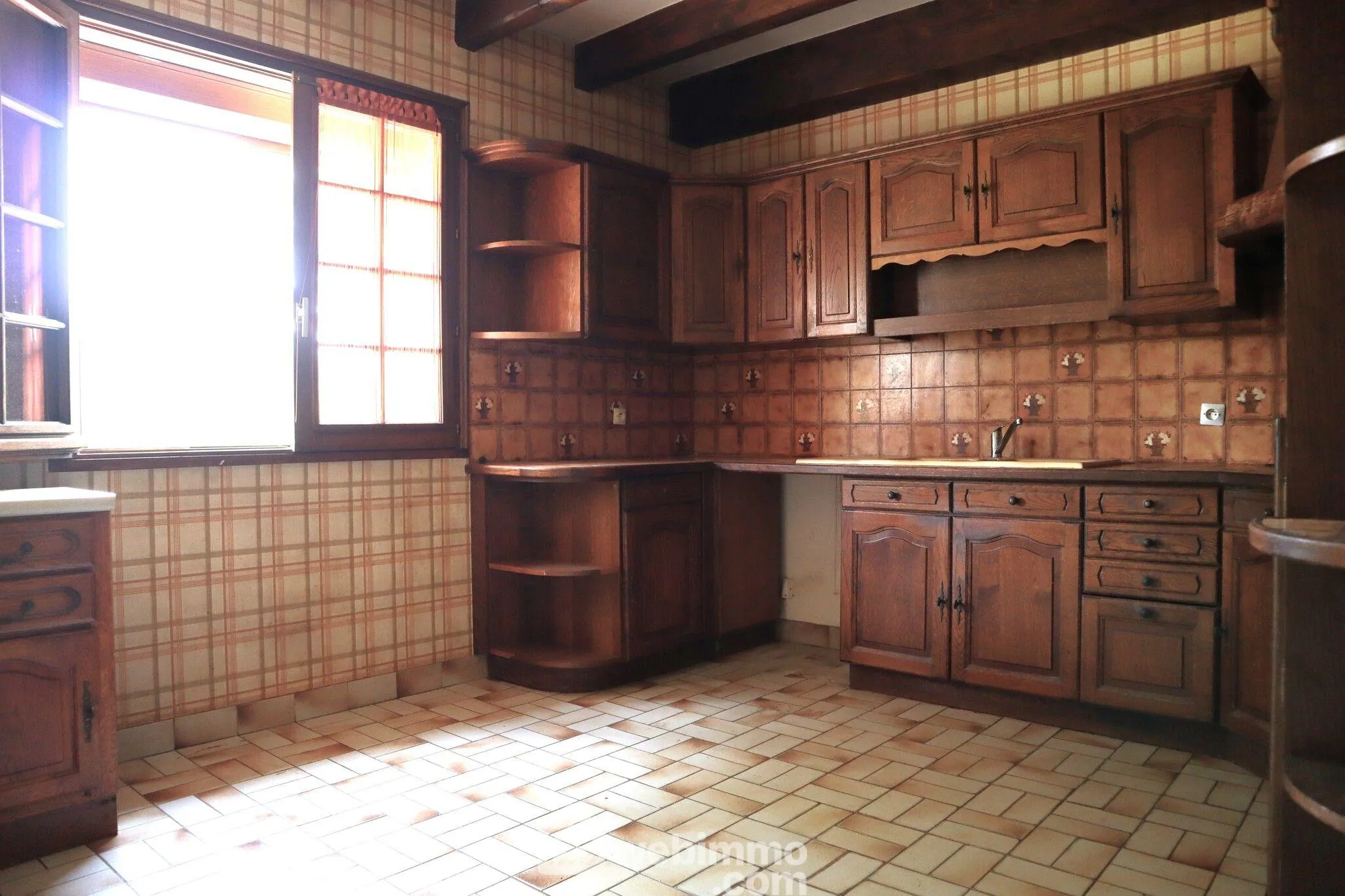 Maison plain-pied avec sous-sol à Bignoux sur terrain de 2187 m² 