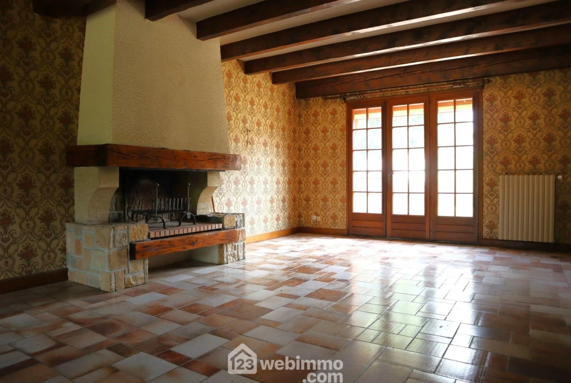 Maison plain-pied avec sous-sol à Bignoux sur terrain de 2187 m² 