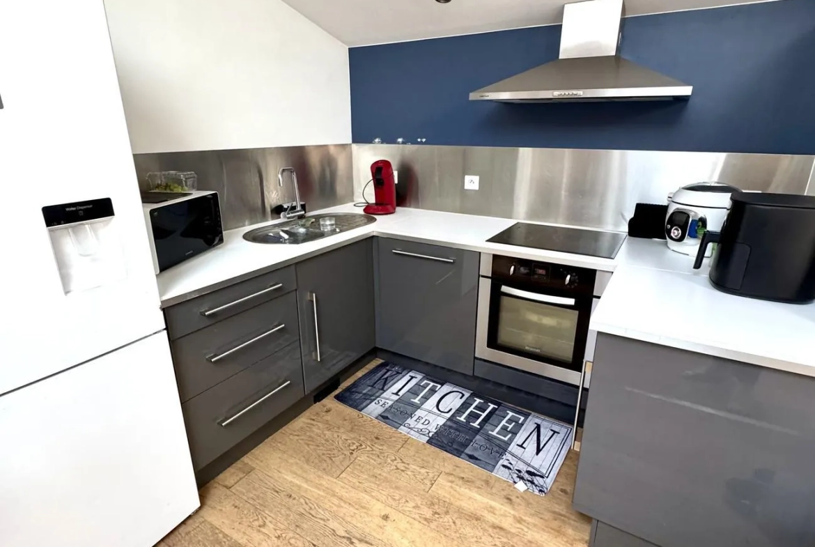 Appartement rénové avec 2 chambres à Épinal - parking privé et lumineux 