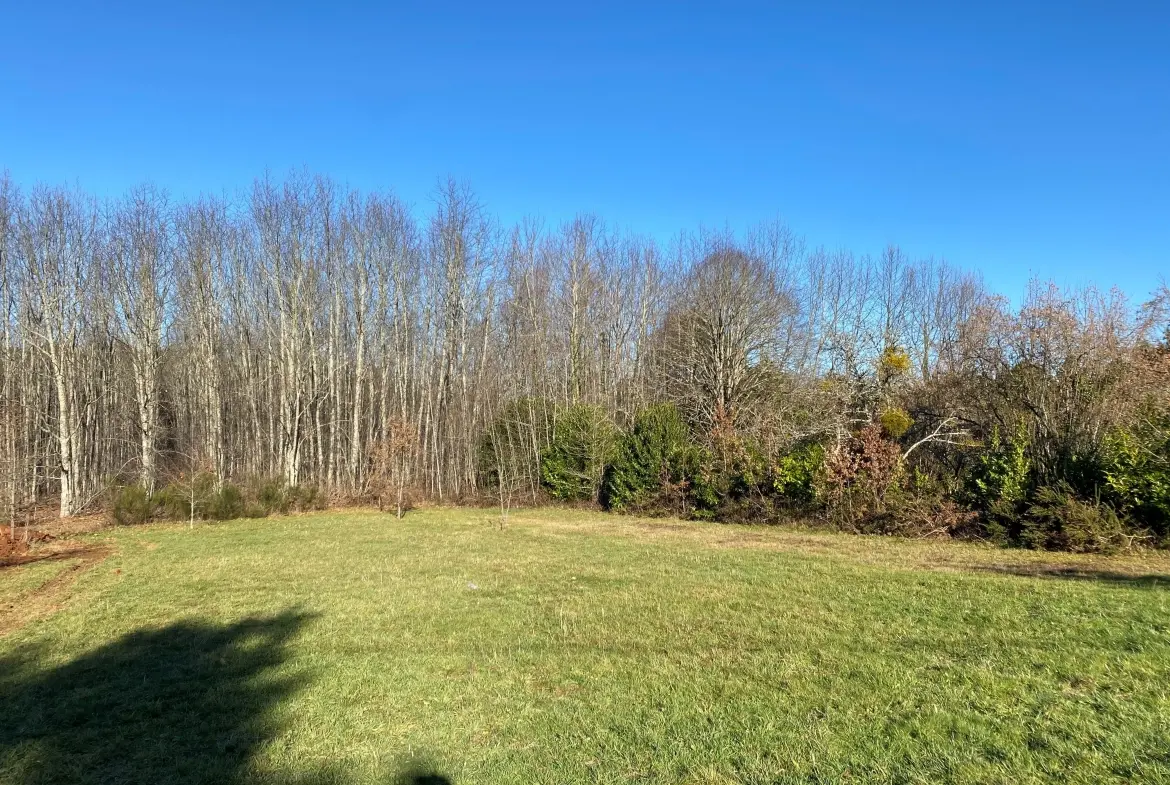 Terrain à bâtir entre Coursac et Notre-Dame-de-Sanilhac de 1450 m² 
