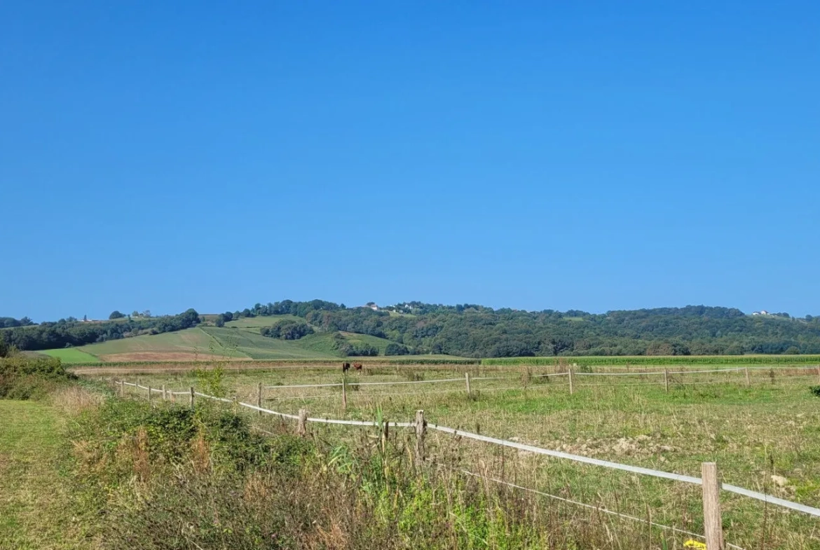 Terrain constructible de 1408 m² à Maslacq, idéal pour projets résidentiels 