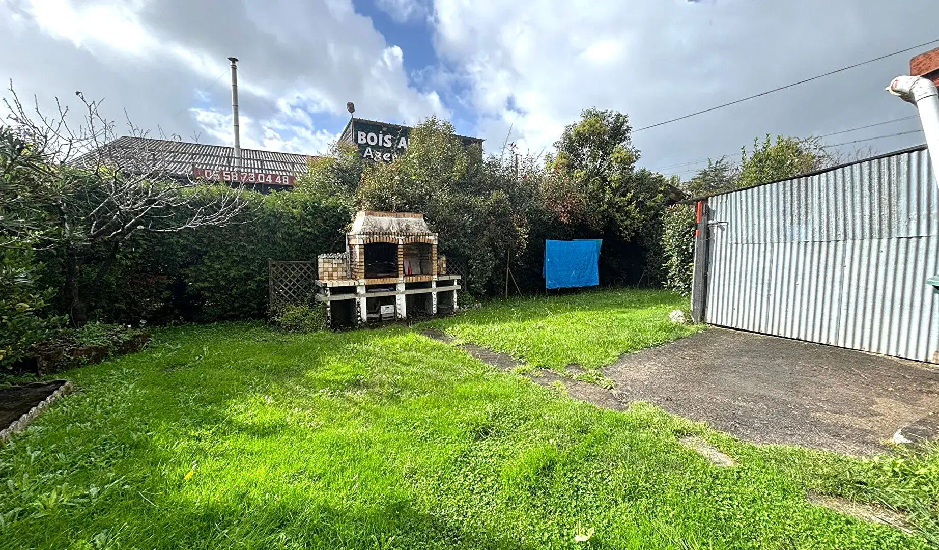 Maison ancienne de 108 m² à Peyrehorade, centre-ville avec garage et jardin 