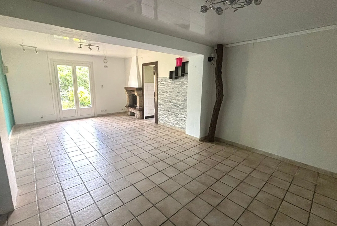 Maison ancienne de 108 m² à Peyrehorade, centre-ville avec garage et jardin 