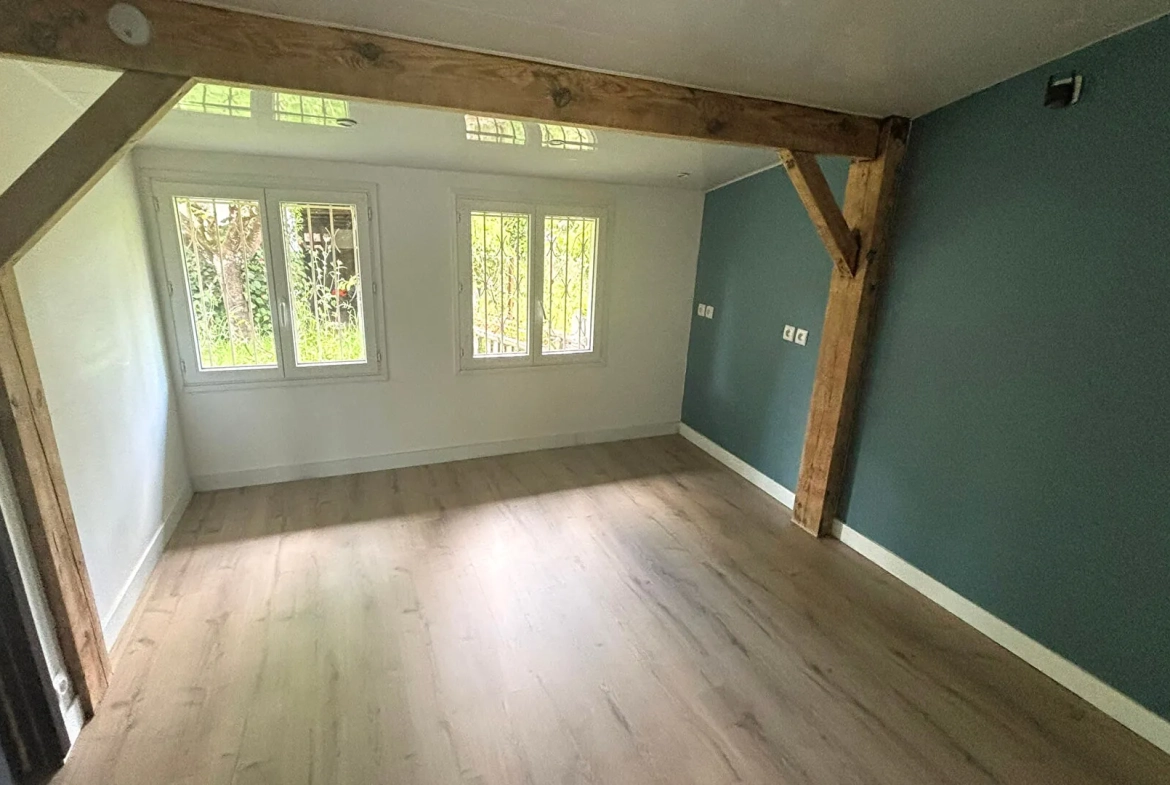 Maison ancienne de 108 m² à Peyrehorade, centre-ville avec garage et jardin 