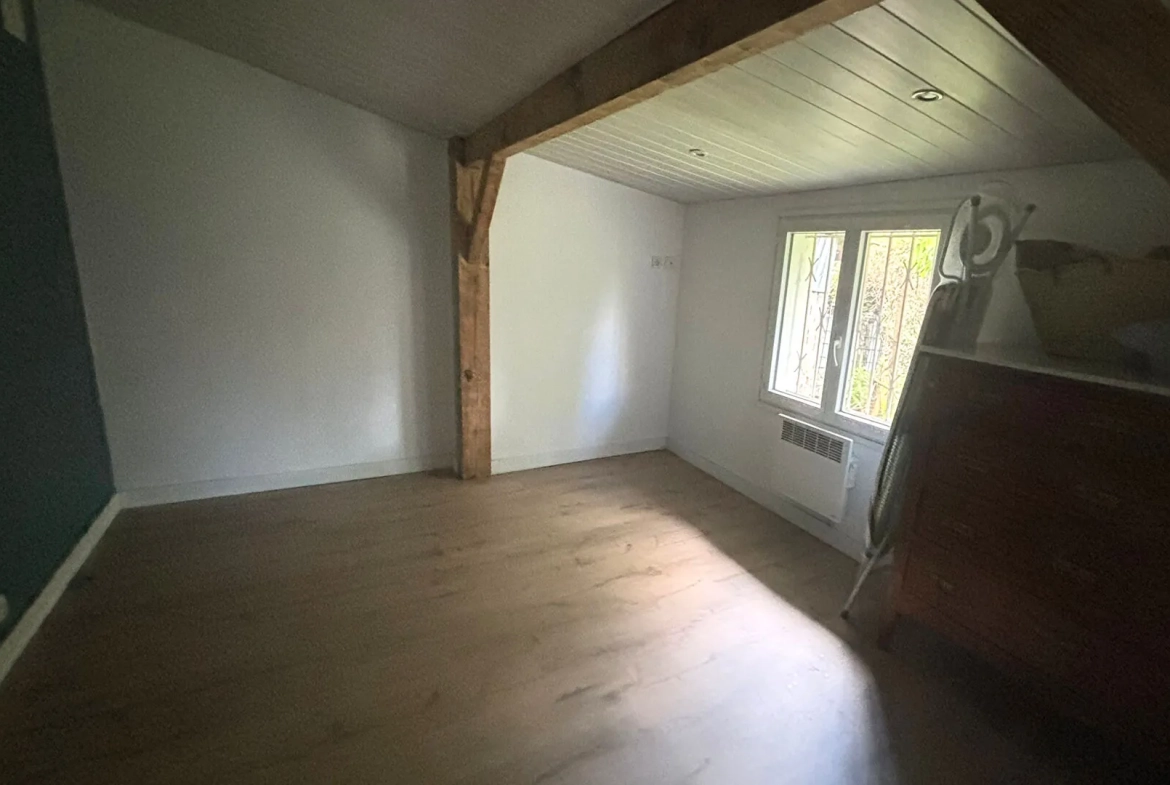 Maison ancienne de 108 m² à Peyrehorade, centre-ville avec garage et jardin 