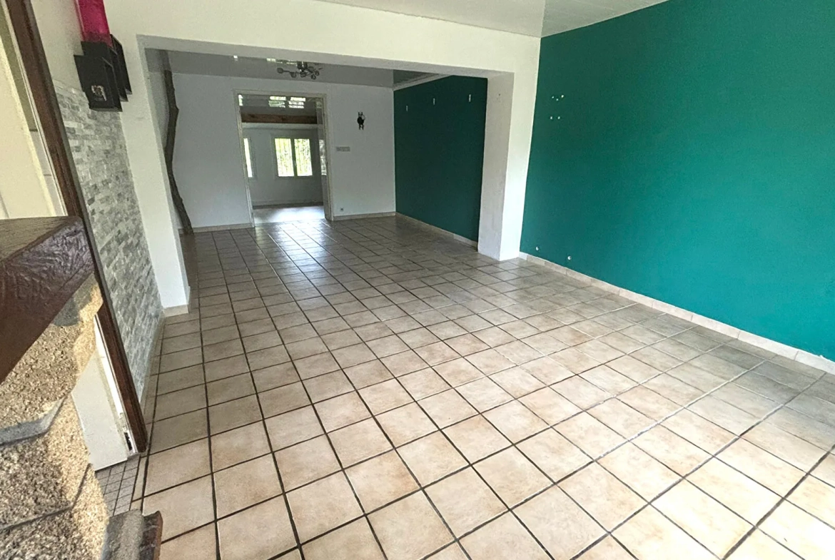 Maison ancienne de 108 m² à Peyrehorade, centre-ville avec garage et jardin 