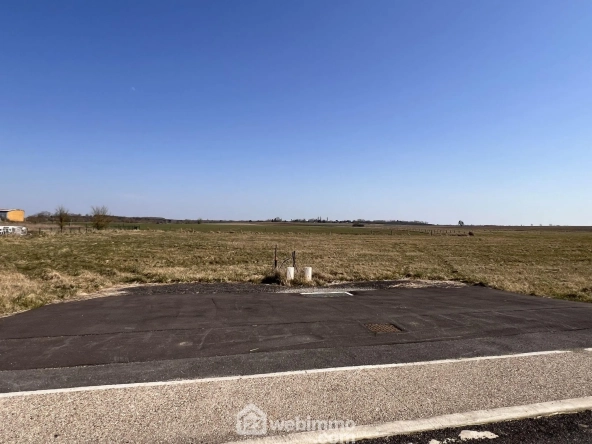 Terrain à bâtir de 1096 m² à Morgemoulin, vue dégagée, viabilisé, idéal pour construction