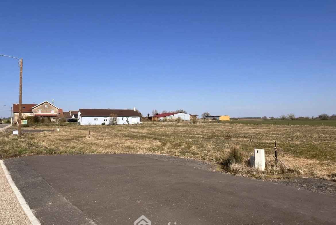 Terrain à bâtir de 1096 m² à Morgemoulin, vue dégagée, viabilisé, idéal pour construction 
