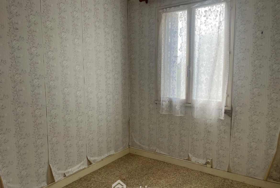 Maison à rénover de 80 m² à Boivre-la-Vallée avec terrain spacieux 