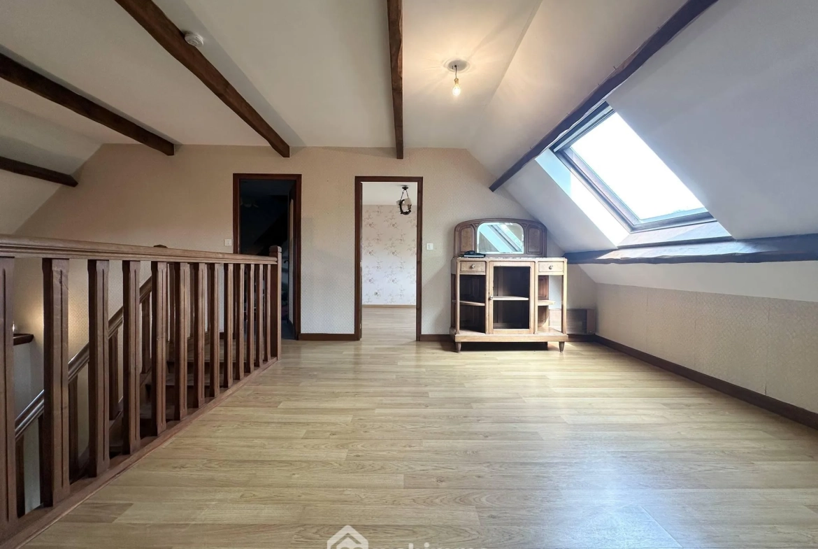 Maison plain-pied à Bruyères-et-Montbérault avec jardin et garage 