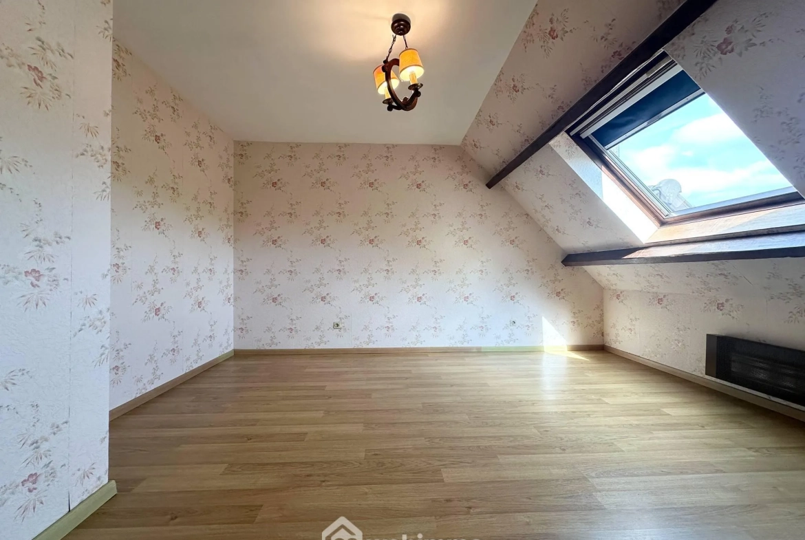 Maison plain-pied à Bruyères-et-Montbérault avec jardin et garage 