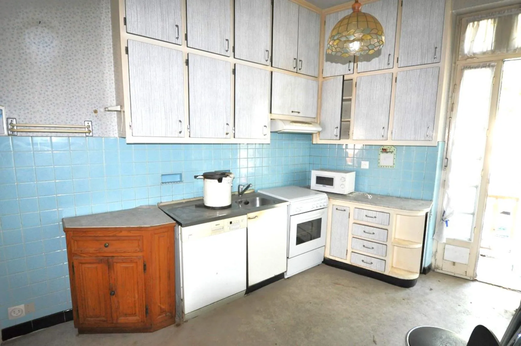 Immeuble à vendre au centre-ville de Carmaux avec potentiel de rénovation et de location 
