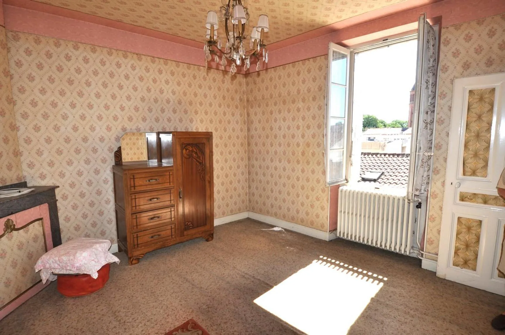 Immeuble à vendre au centre-ville de Carmaux avec potentiel de rénovation et de location 