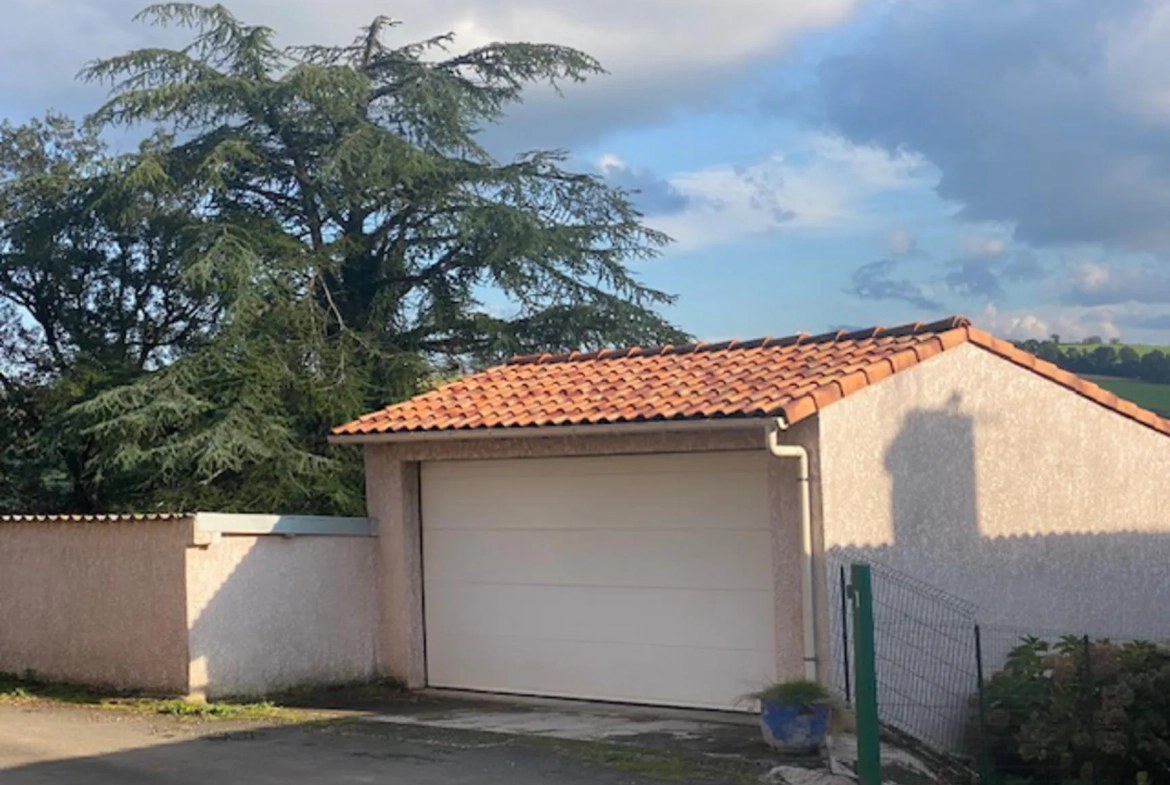 Maison de Village à Alban avec garage et terrain de 1181 m² à rénover 