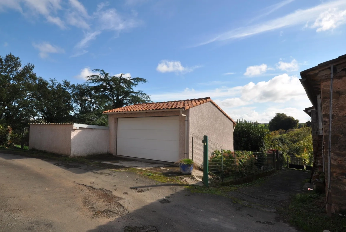 Maison de Village à Alban avec garage et terrain de 1181 m² à rénover 