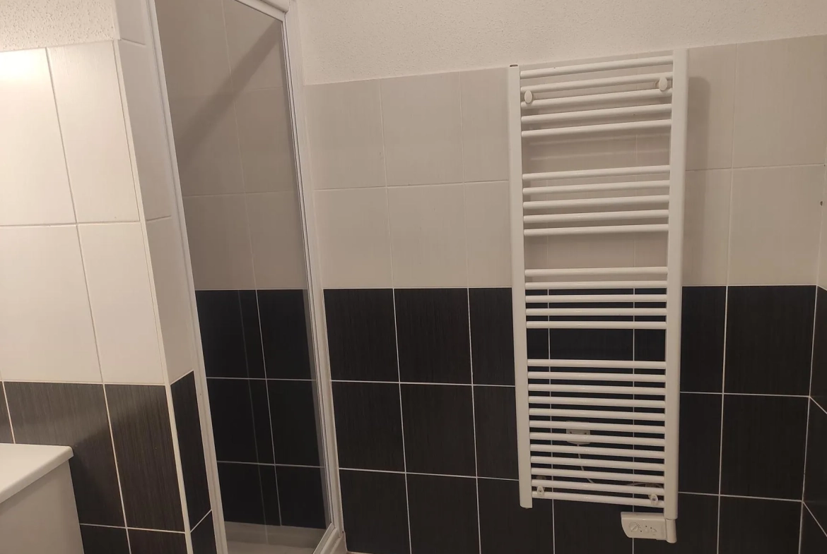 Appartement 46 m² à Épinal avec terrasse, ascenseur et parking couvert 