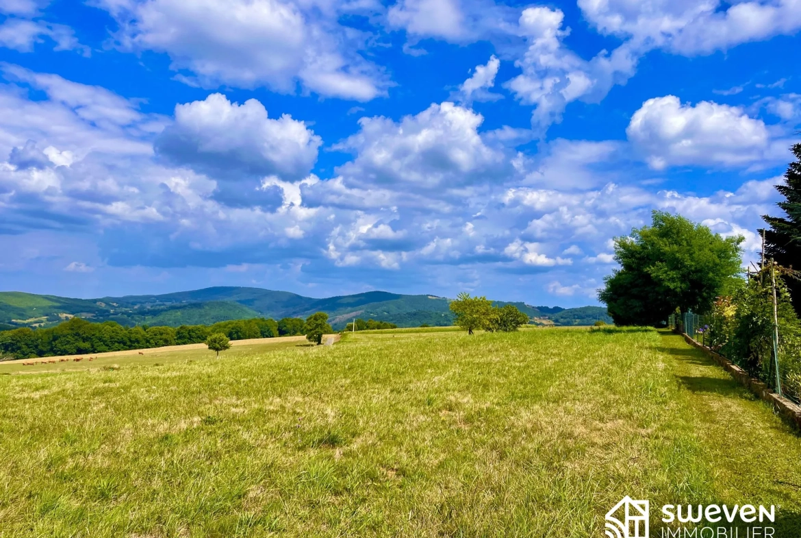 A VENDRE COUSERANS  Terrain constructible de 2358 m² avec vue à Sainte Croix Volvestre 