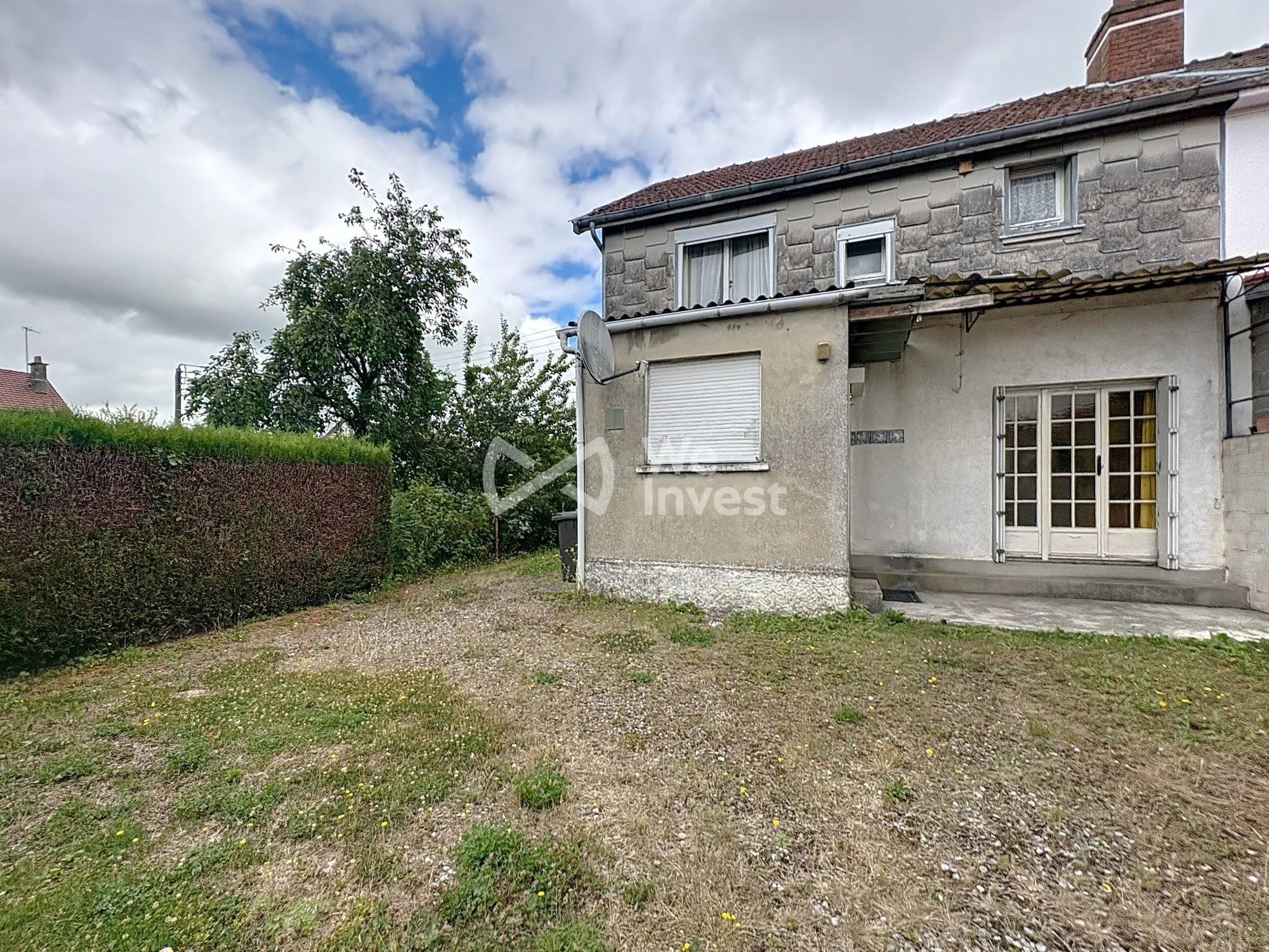 Maison à rénover de 80 m² avec jardin et garage à Aulnoye-Aymeries 