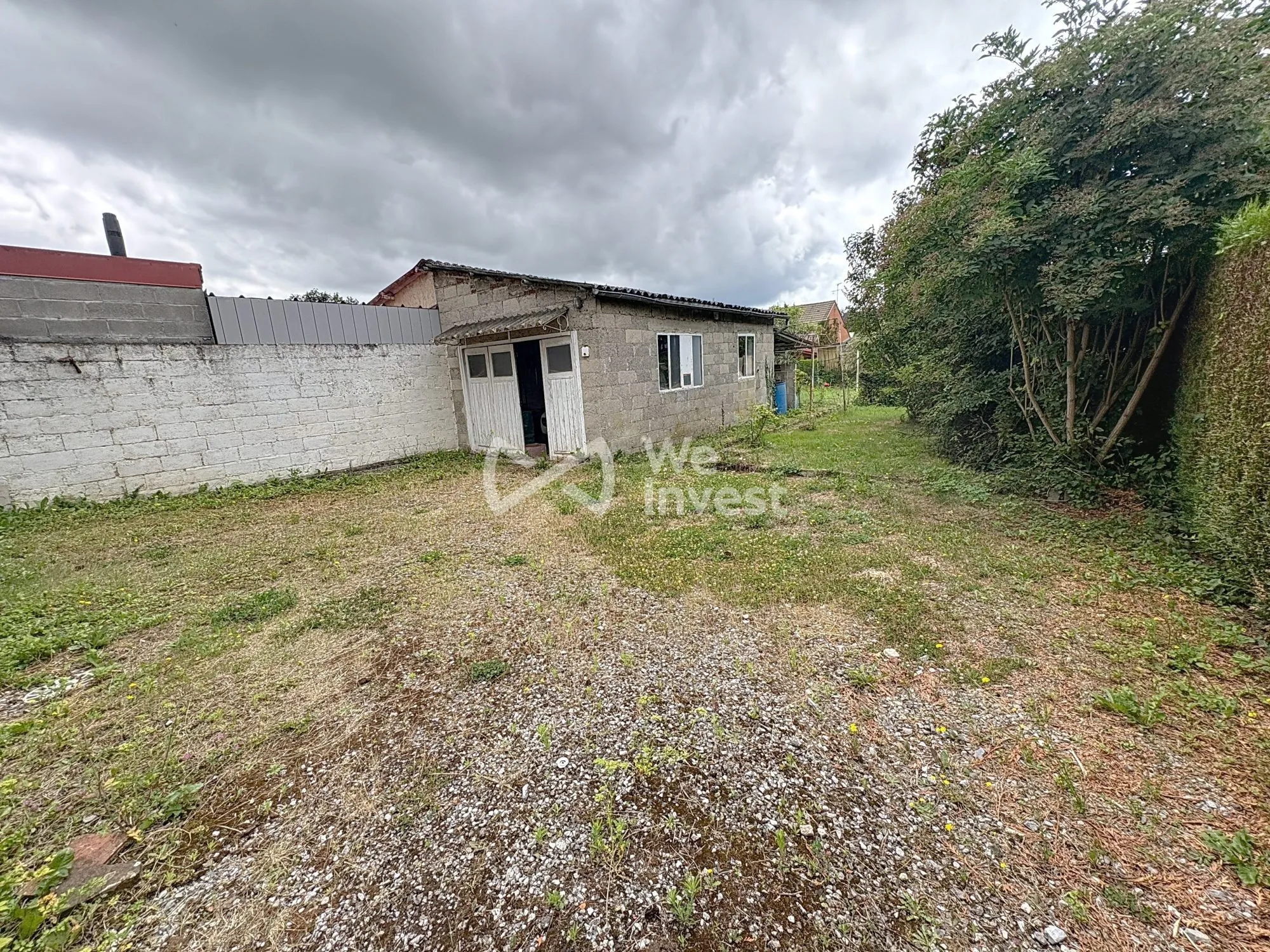 Maison à rénover de 80 m² avec jardin et garage à Aulnoye-Aymeries 