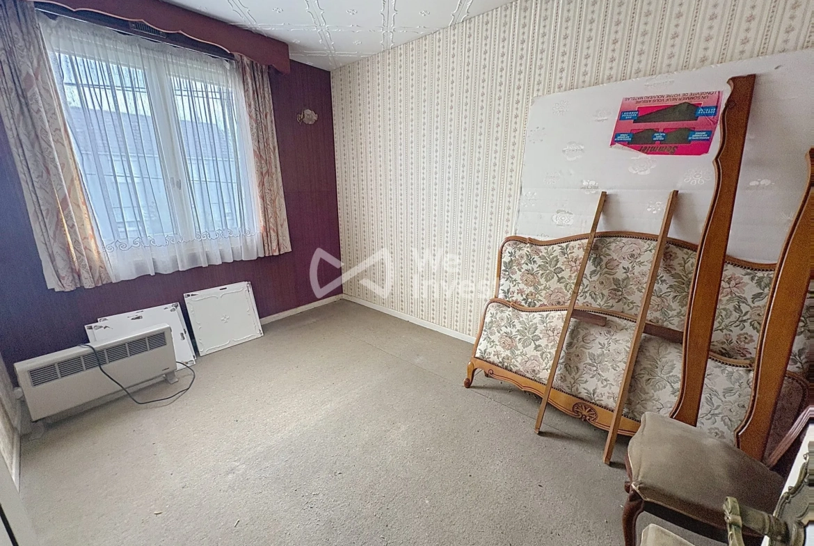 Maison à rénover de 80 m² avec jardin et garage à Aulnoye-Aymeries 