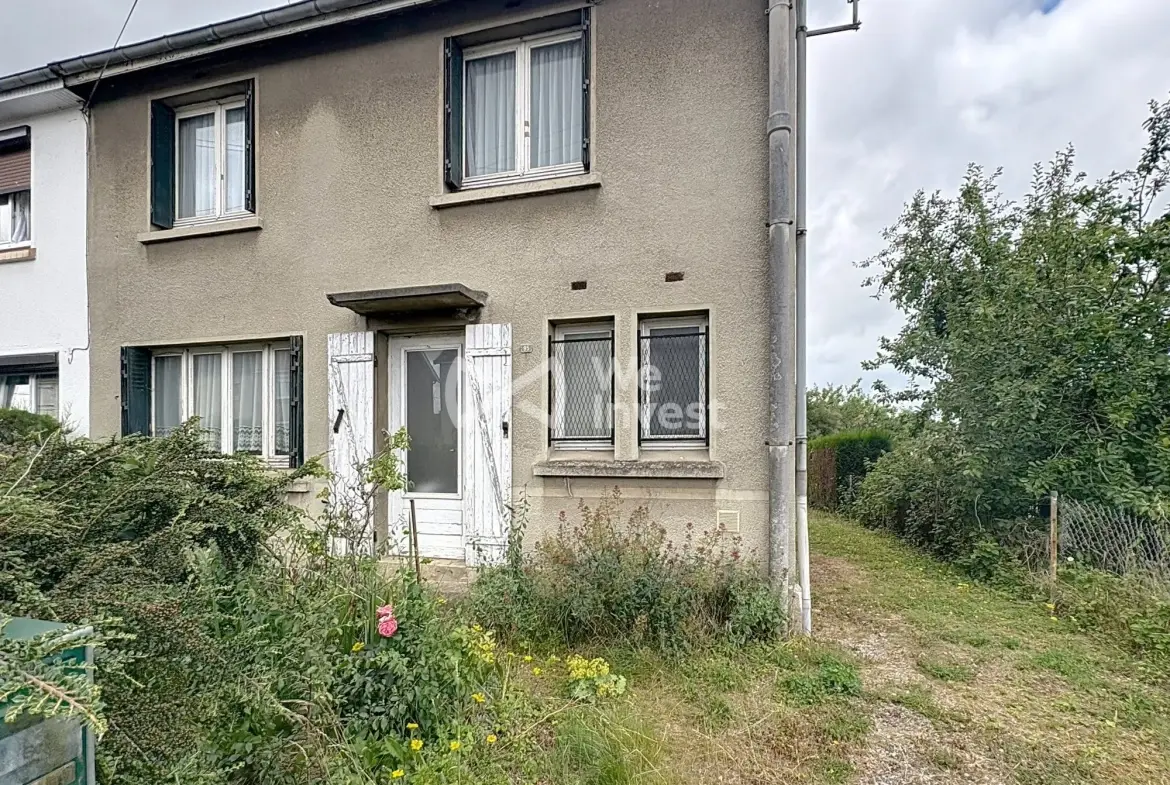 Maison à rénover de 80 m² avec jardin et garage à Aulnoye-Aymeries 
