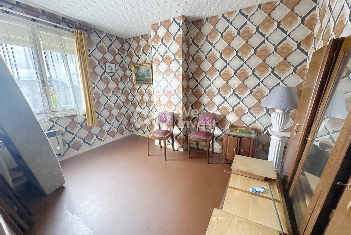 Maison à rénover de 80 m² avec jardin et garage à Aulnoye-Aymeries 
