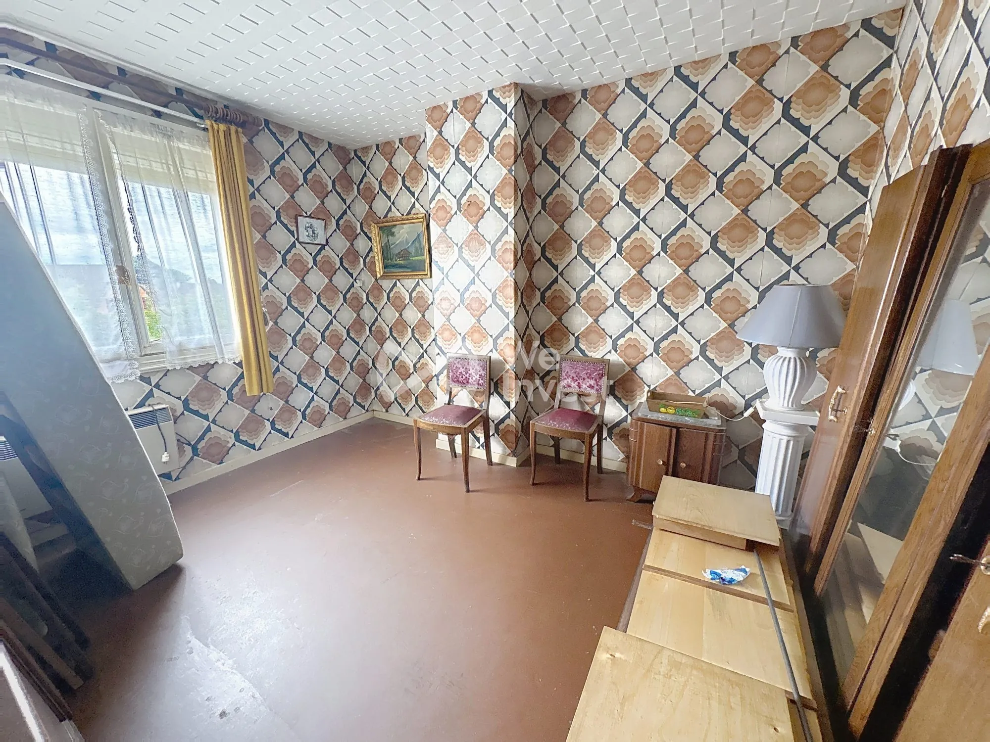 Maison à rénover de 80 m² avec jardin et garage à Aulnoye-Aymeries 