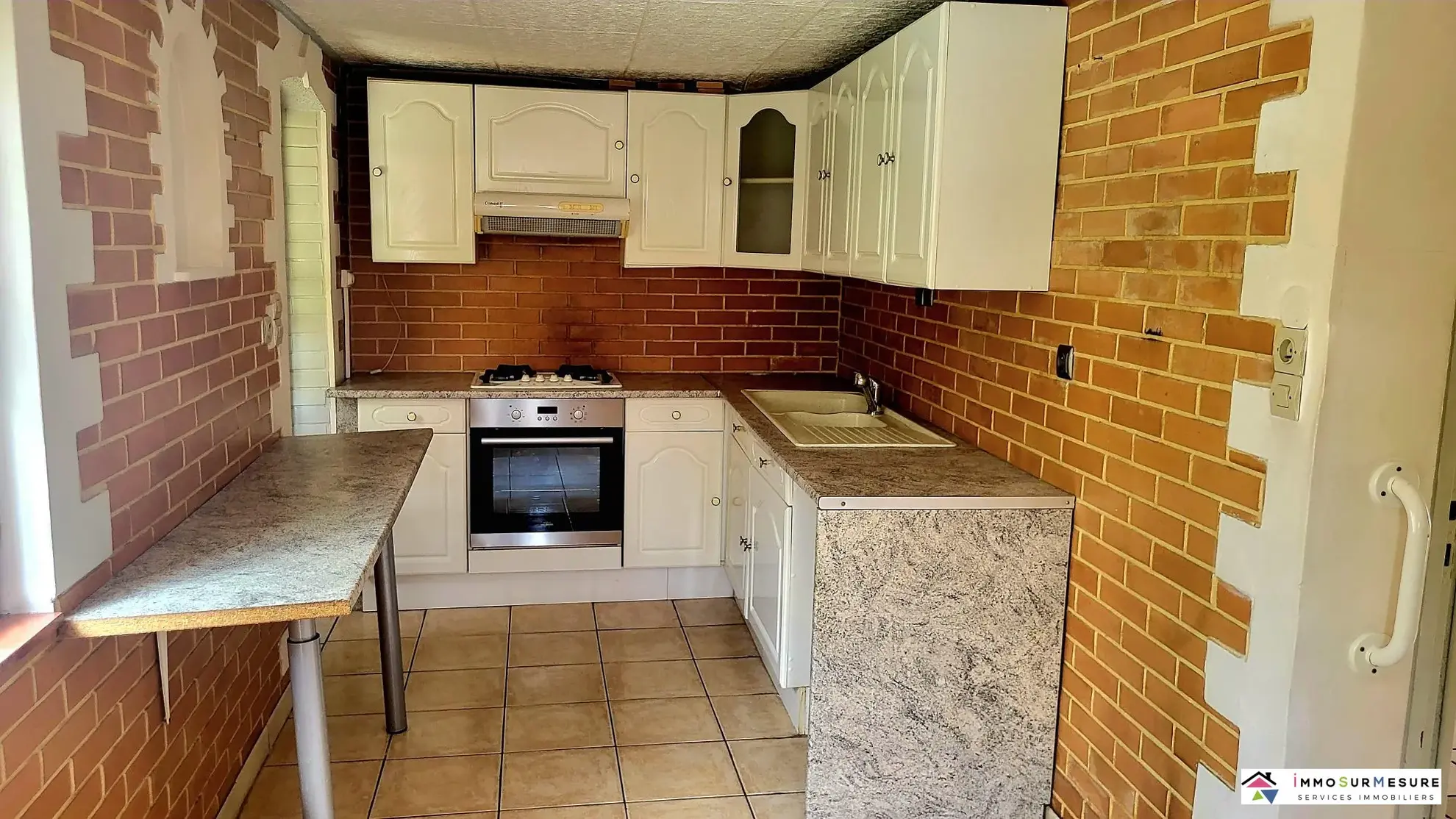 Maison familiale à Annezin avec 3 chambres, jardin et garage 