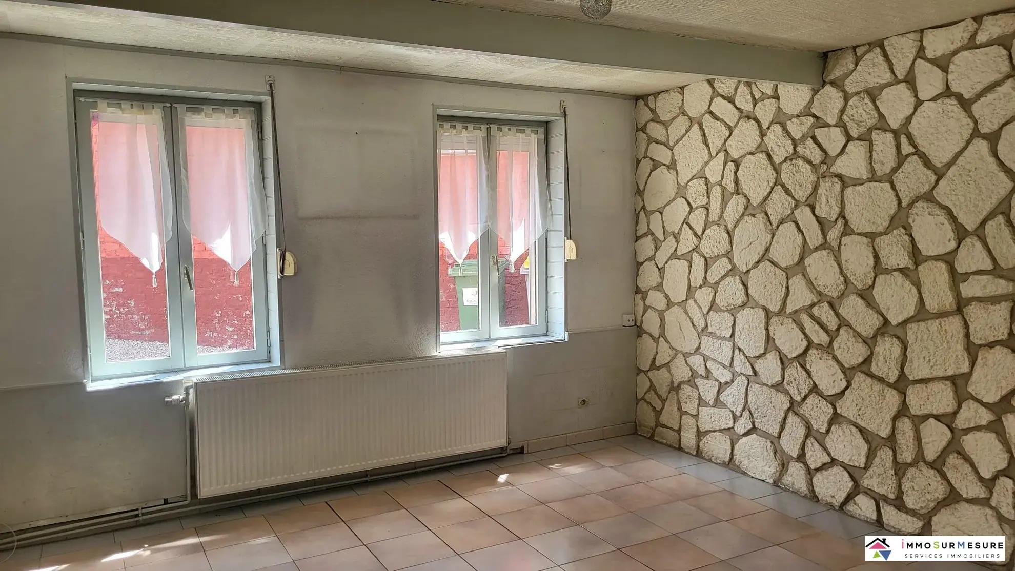 Maison familiale à Annezin avec 3 chambres, jardin et garage 