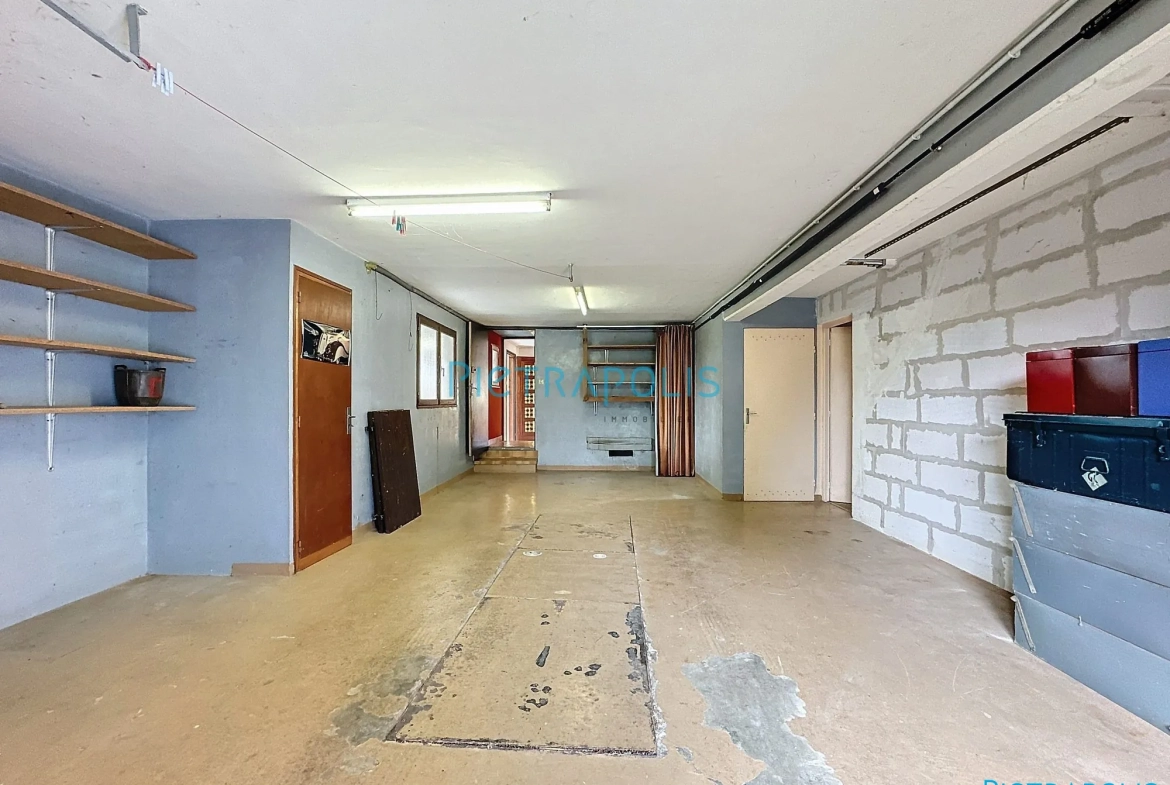 Appartement CIVRIEUX : garage Appartement T3 de 100 m² avec terrain privatif à Civrieux 