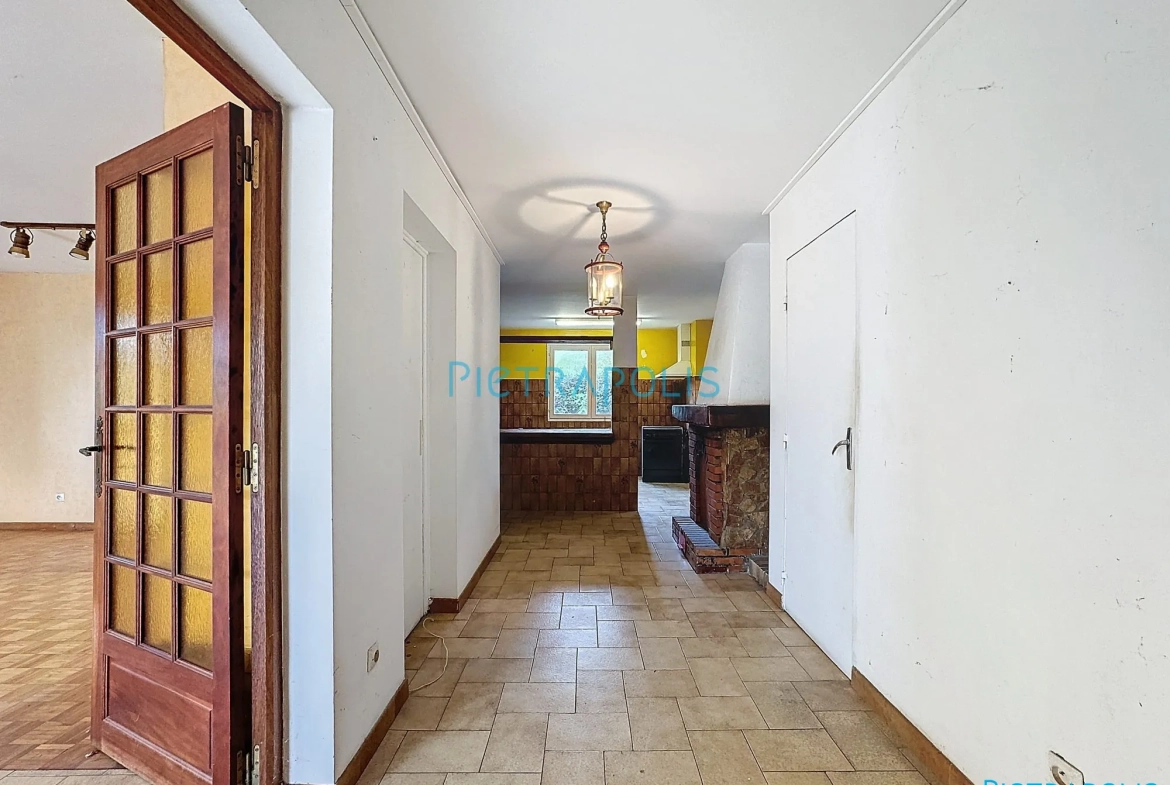 Appartement CIVRIEUX : entrée Appartement T3 de 100 m² avec terrain privatif à Civrieux 