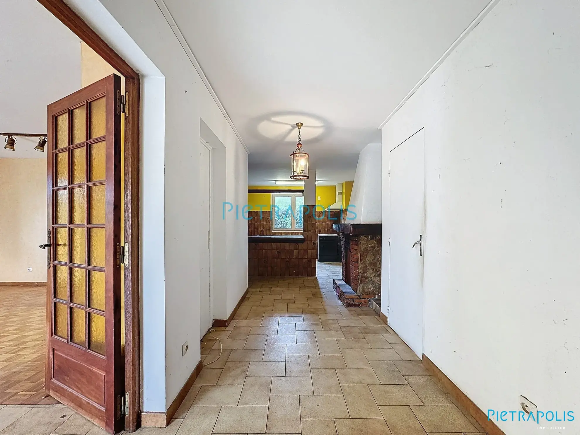 Appartement CIVRIEUX : entrée Appartement T3 de 100 m² avec terrain privatif à Civrieux 