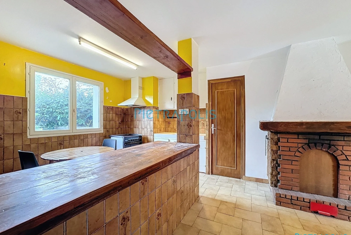 Appartement CIVRIEUX : cuisine Appartement T3 de 100 m² avec terrain privatif à Civrieux 