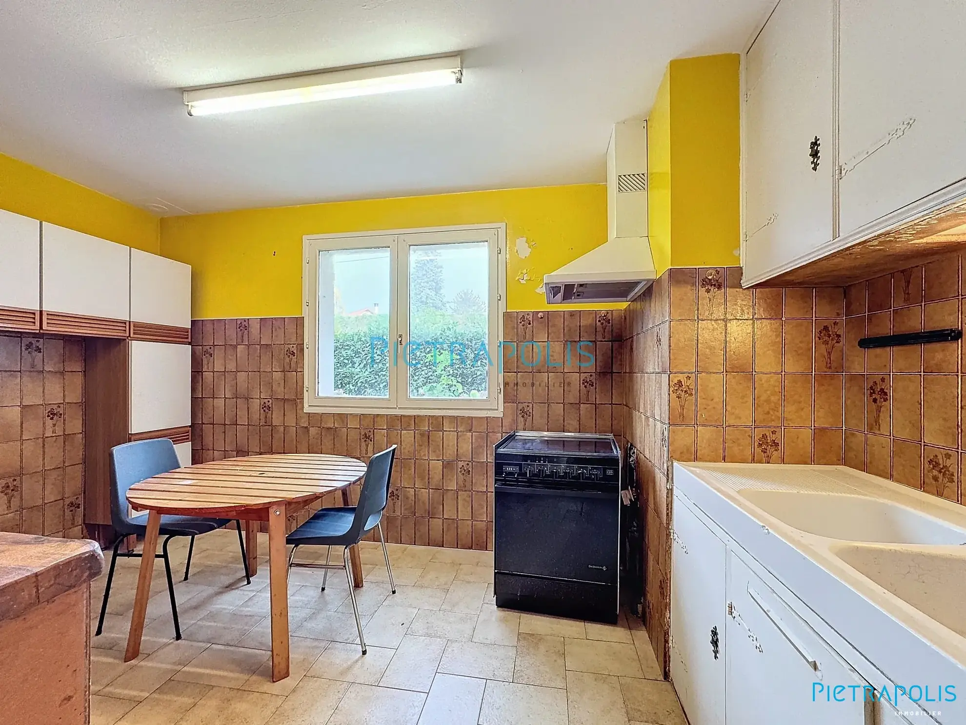 Appartement CIVRIEUX : cuisine Appartement T3 de 100 m² avec terrain privatif à Civrieux 