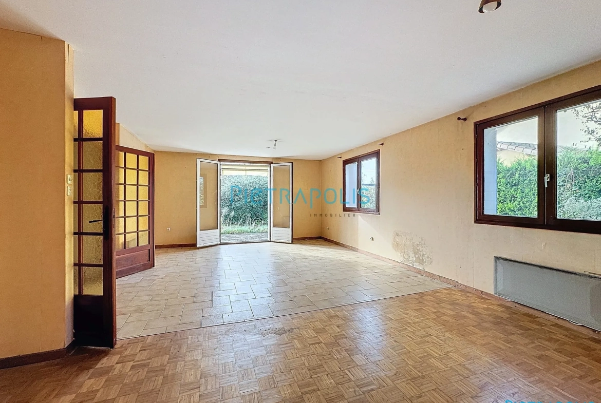 Appartement CIVRIEUX : séjour Appartement T3 de 100 m² avec terrain privatif à Civrieux 