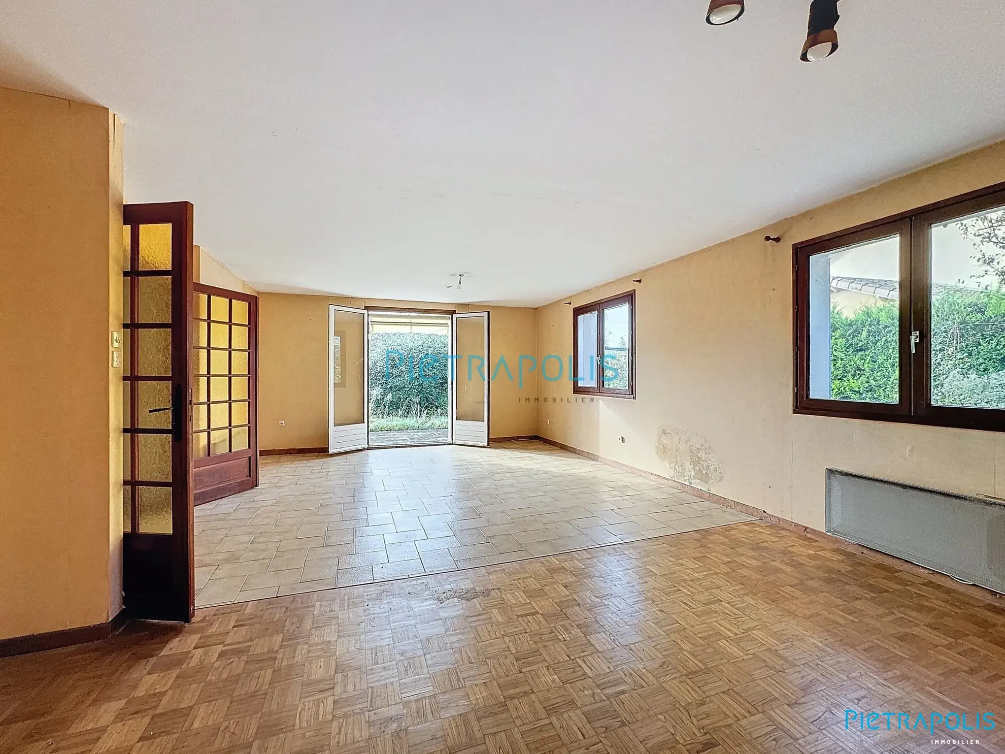 Appartement CIVRIEUX : séjour Appartement T3 de 100 m² avec terrain privatif à Civrieux 