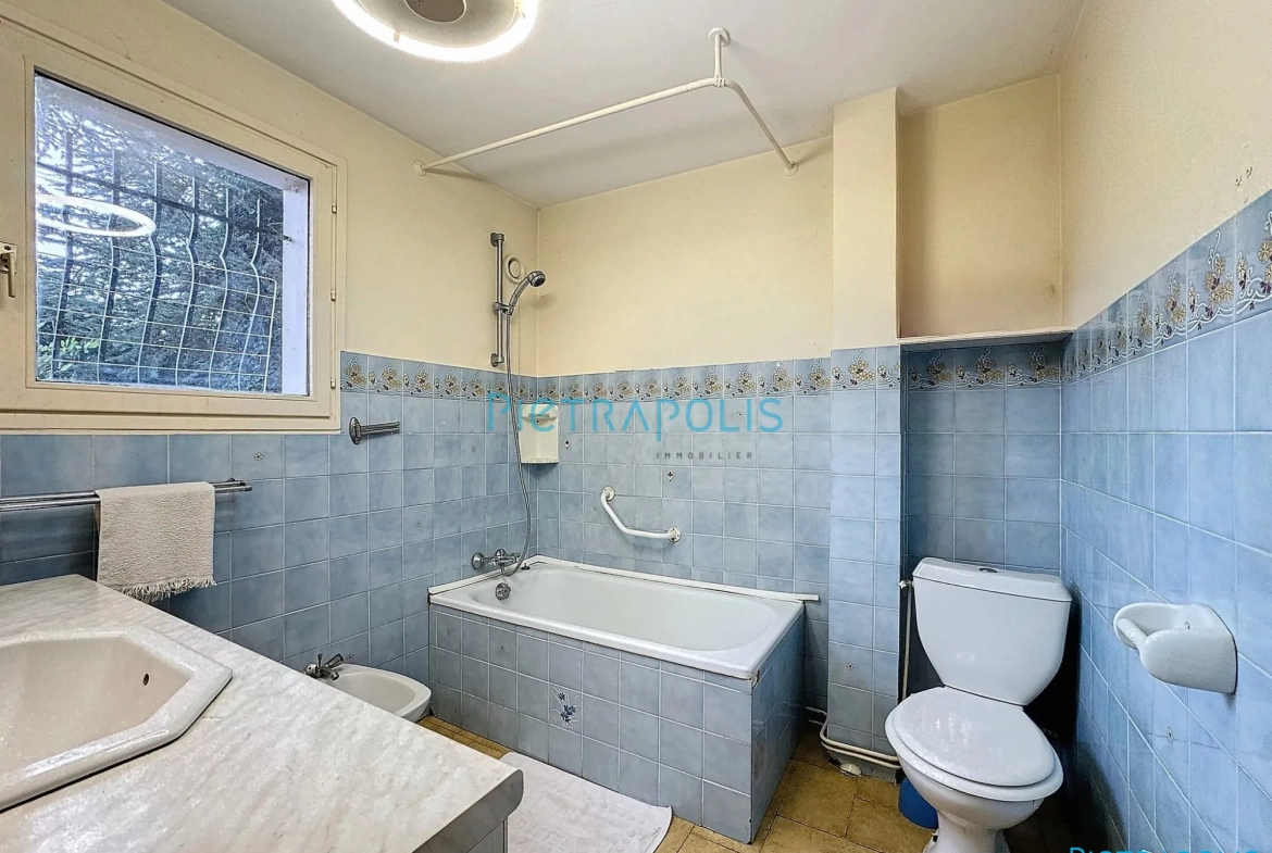 Appartement T3 de 100 m² avec terrain privatif à Civrieux 