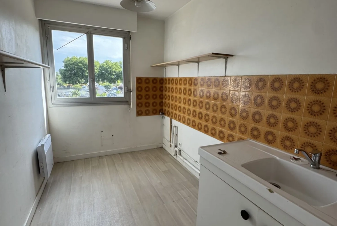 Appartement 3 pièces à vendre à Saintes - Lumineux et pratique 