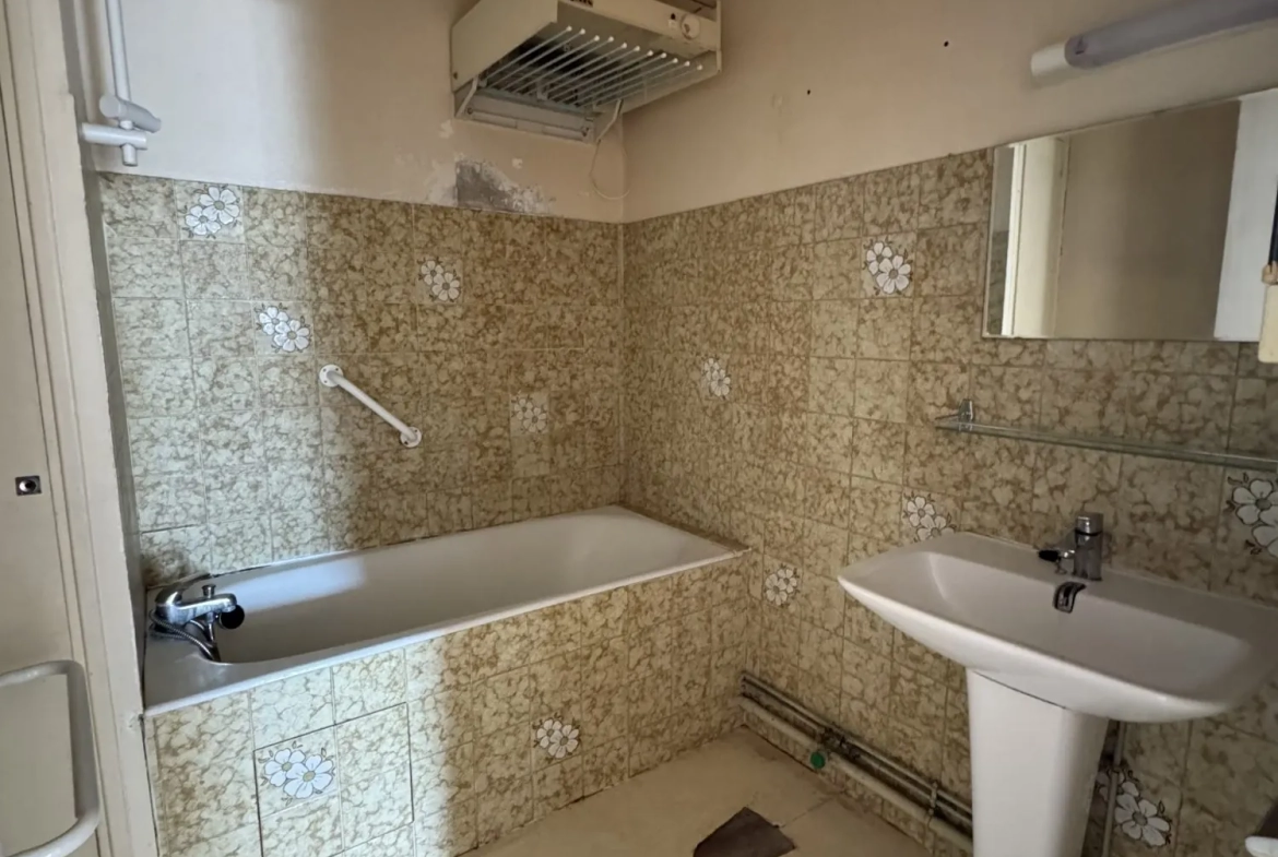 Appartement 3 pièces à vendre à Saintes - Lumineux et pratique 