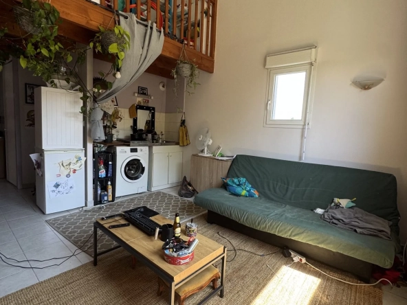 Appartement 2 pièces en duplex avec parking à Saintes - Opportunité d'investissement