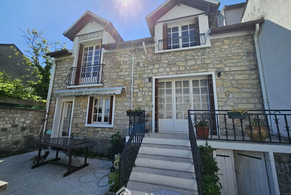 Maison de ville à Veneux-Les-Sablons avec jardin et potentiel de rénovation 