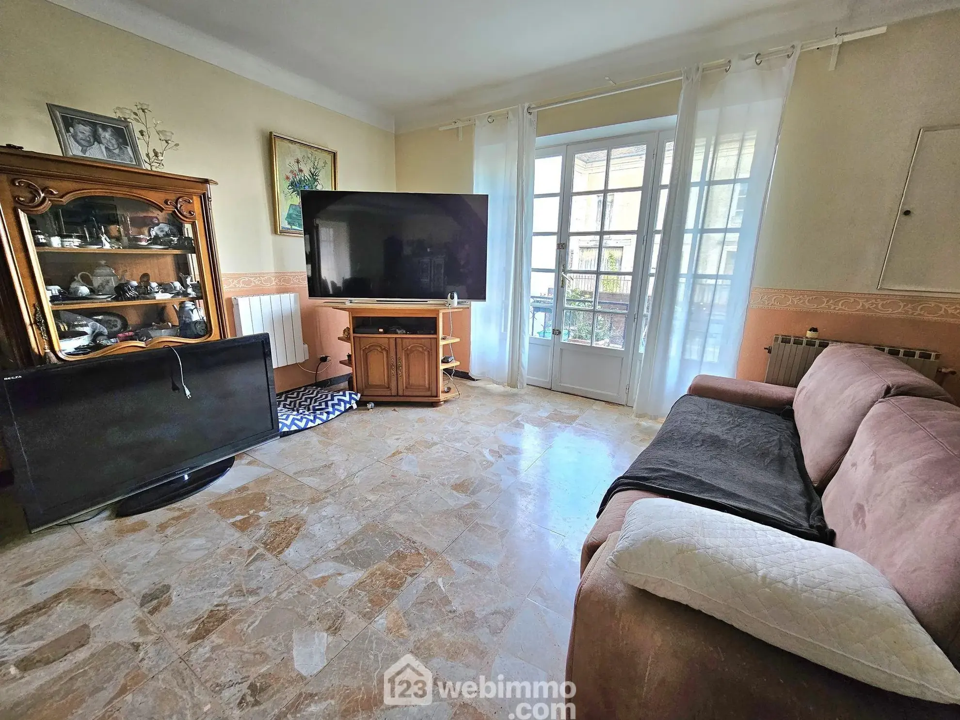 Maison de ville à Veneux-Les-Sablons avec jardin et potentiel de rénovation 